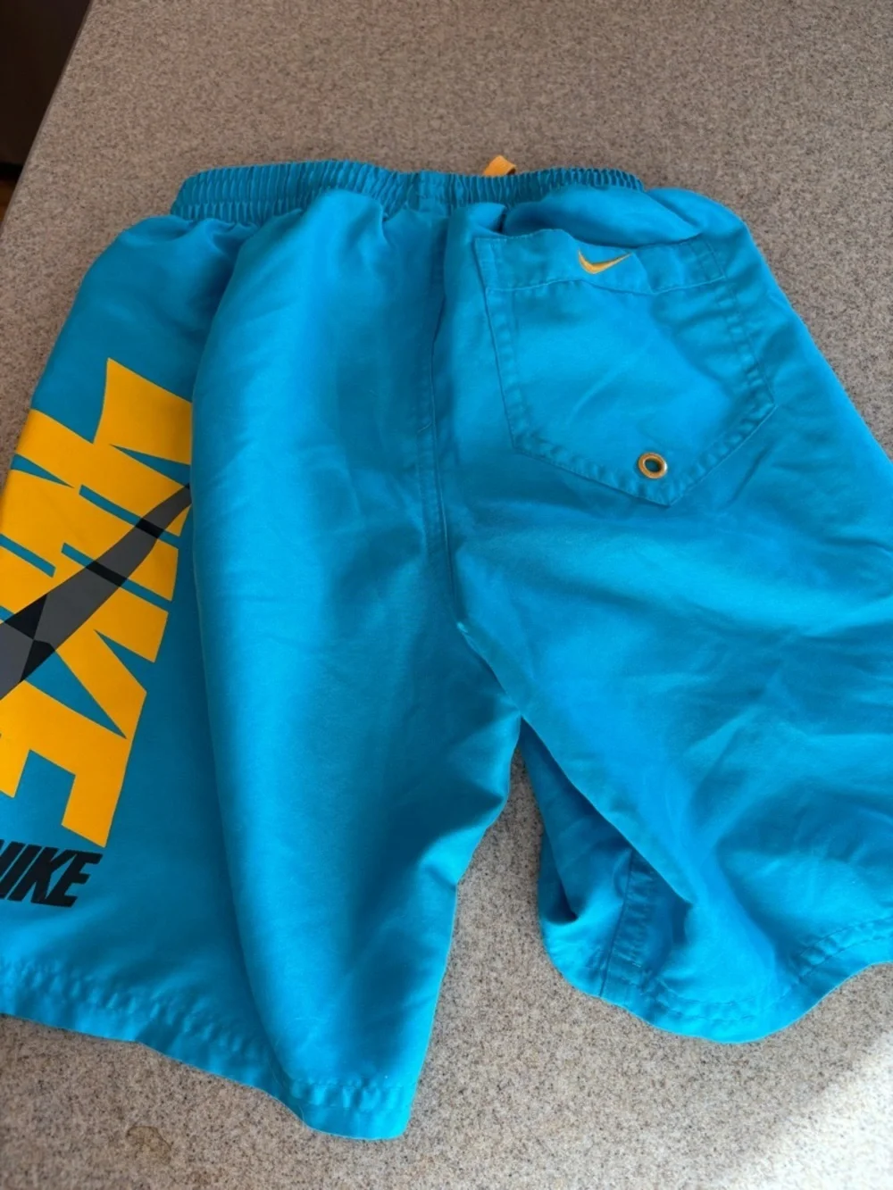 Nike Bright Blue and Orange lined Swim Shorts and Black Logo size small